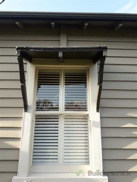 repair  wooden window awning  builderscrack