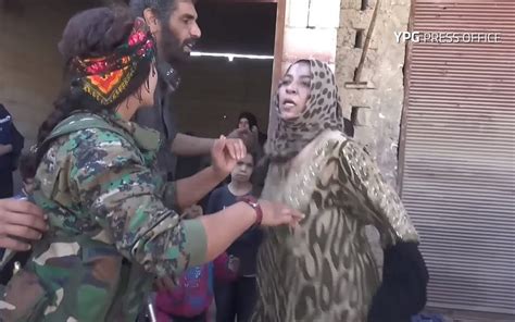 woman rips off oppressive garments as raqqa liberated from is the