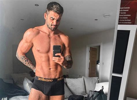 adam collard sends fans wild with his huge bulge as he poses in his