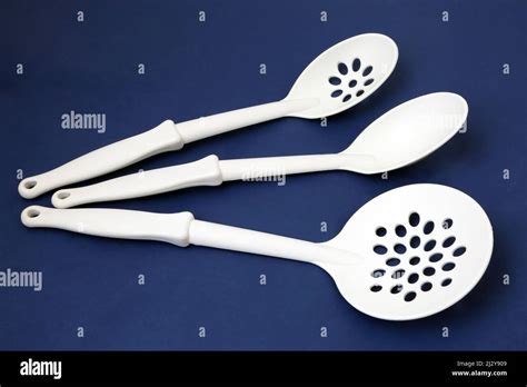 white plastic cooking utensils stock photo alamy