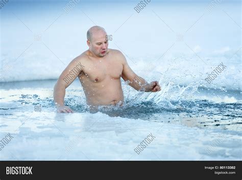 adult man swimming icy image and photo free trial bigstock