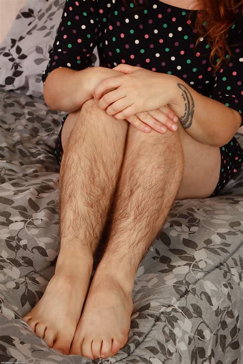 hirsute model velma posing hairy legs in heels and spreading beaver