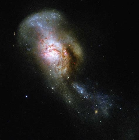 hubble captures  galaxies colliding skyatnightmagazine