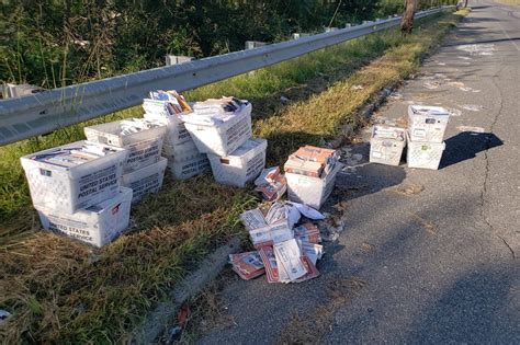 postal service worker quits job leaves mail  side  road