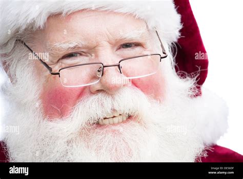 close  face shot  santa claus smiling  wearing glasses stock