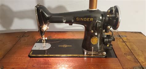 singer sewing machine  parlor cabinet