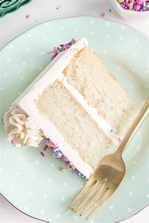 classic white cake recipe pairs fluffy vanilla cake layers
