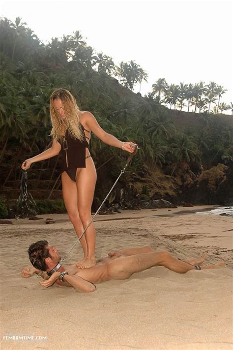 nude leashed male slave gets dominated by clothed blonde