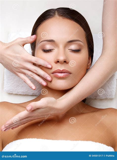 Face Massage Close Up Of A Young Woman Getting Spa Treatment Royalty