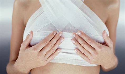 new breasts for christmas plastic surgeons report huge increase in