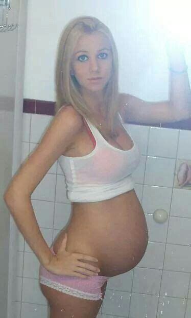 pregnant girl bathroom selfie tight tank top pretty pregnant fashion