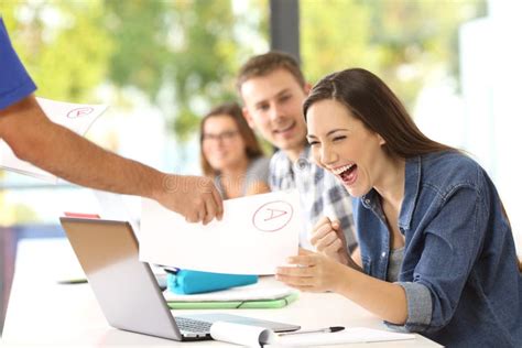 excited student receiving  approved exam stock image image