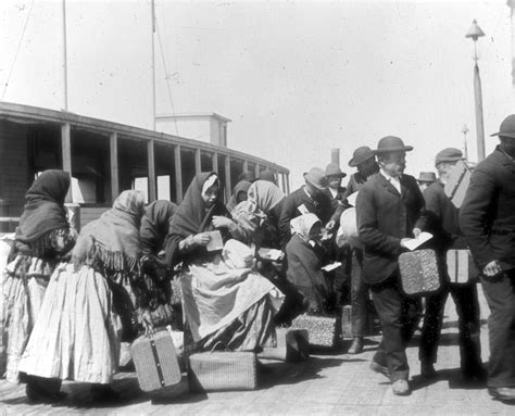 photograph  immigrants arriving  ellis island ca  dpla