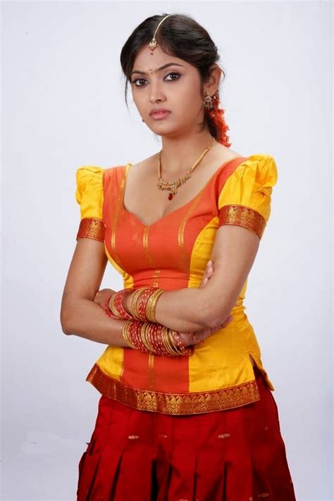 desi actress pictures supurna malakar latest hot cleveage spicy yellow half saree photoshoot