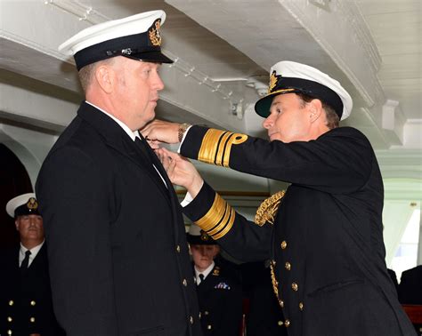 warrant officer receives top award for meritorious service royal navy