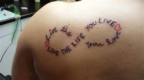 my first tattoo live the life you love love the life you live tattoo