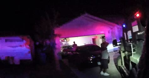 las vegas police videos show moments before home is raided in tupac