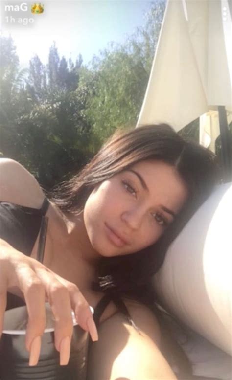 Kylie Jenner Shows Top Of Pregnancy Bump And Enormous Cleavage In