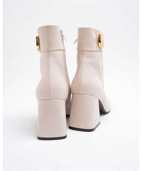 cream calf leather golden trim ankle boots