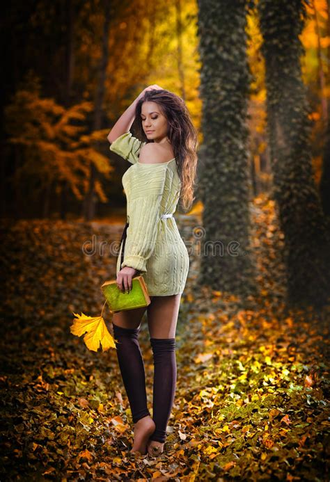 Young Caucasian Sensual Woman In A Romantic Autumn Scenery Fall Lady
