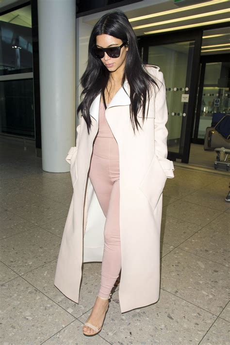 kim kardashian wore a pink jumpsuit to the airport that looks like