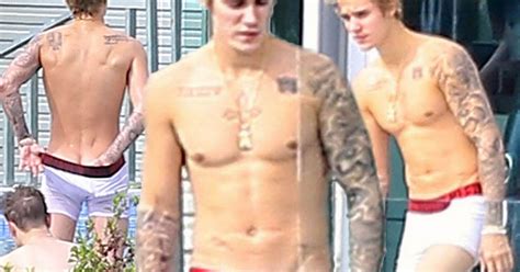 justin bieber shows off buff body poolside in pair of tight calvin