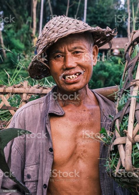 Vertical Portrait Of A South Asian Balinese Senior Men Wearing A