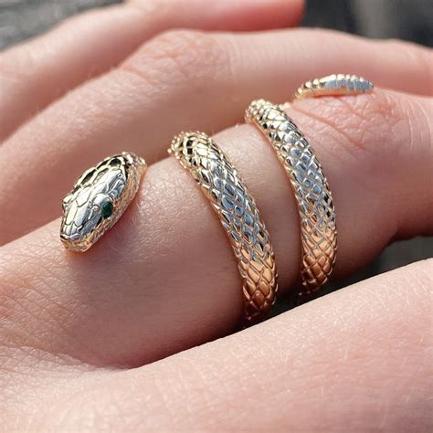 ct yellow gold snake ring  emerald set eyes baroque bespoke