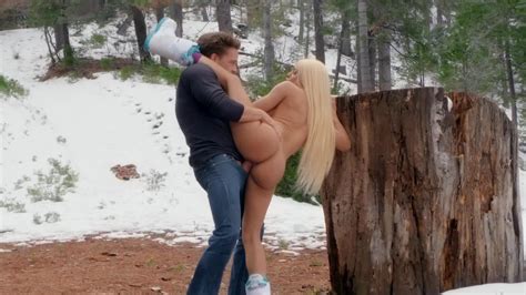 snow bunny in boots banging outdoors in the winter