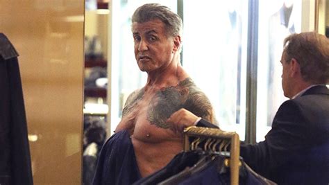 sylvester stallone goes shirtless to show off ripped chest