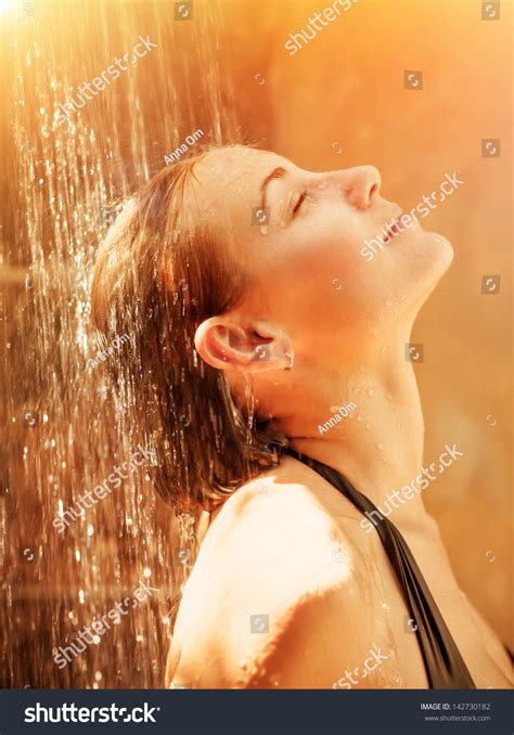 Attractive Female Taking Shower With Pleasure Cute Girl With Closed