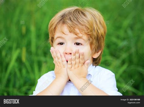 funny child boy hands image photo  trial bigstock