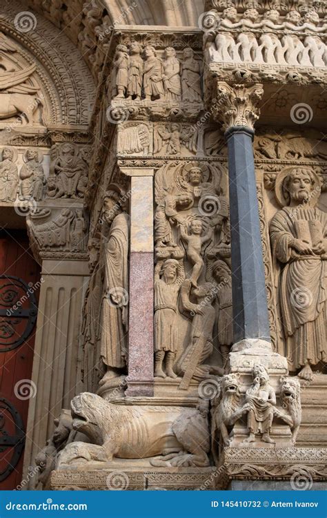 romanesque sculptures  beasts   west portal   church  st trophime editorial
