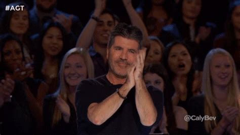 happy simon cowell by america s got talent find