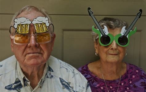 portrait of an older couple wearing goofy glasses flickr