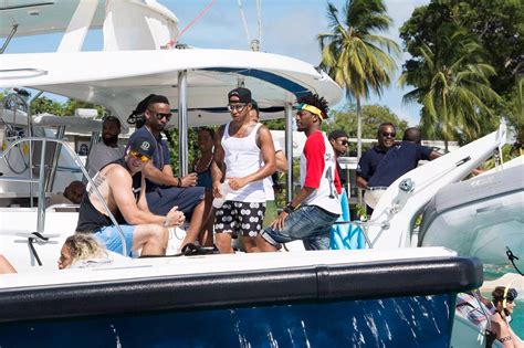 rihanna and lewis hamilton are spotted doing watersports while on
