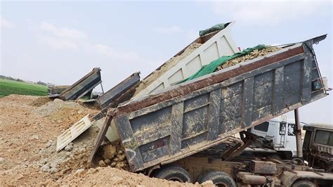 heavy dirt dump truck unloading soil   time youtube