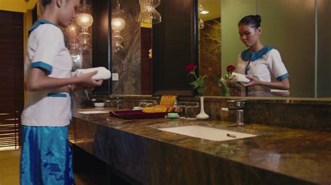 asian housekeeper cleaning hotel room woman people working girl in