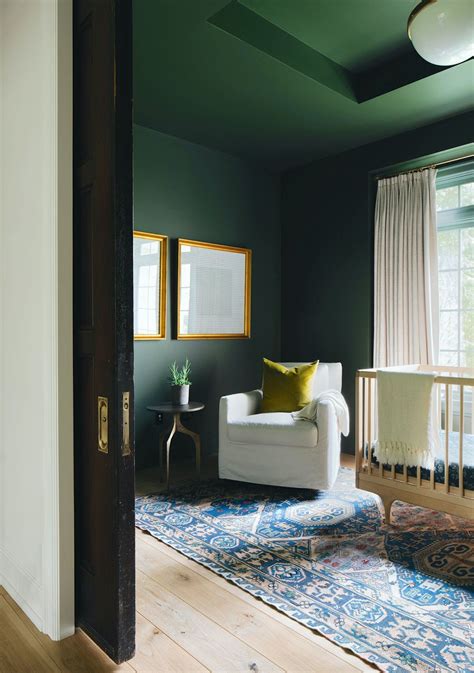 jean stoffer  modern classic sophisticated nursery dark green walls laurel home