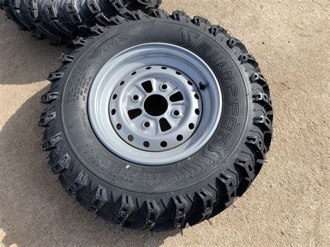 atv front rims tyres package      ams swamp fox trx   ozark