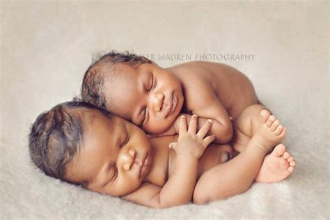 touching images  beautiful black newborns twin baby