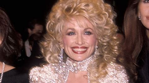 watch dolly parton s biggest hair moments allure