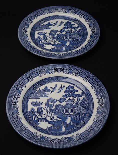 pair  churchill blue willow china dinner plates england displayed