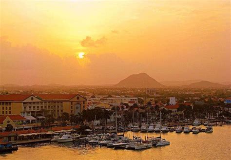 sunrise over oranjestad aruba aruba beautyfull places adventure travel