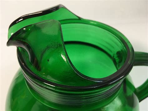 vintage green glass pitcher rould large emerald green pitcher