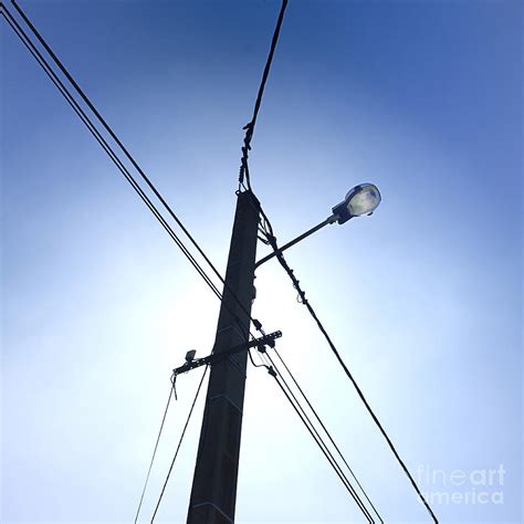 Street Lamp And Power Lines Photograph By Bernard Jaubert
