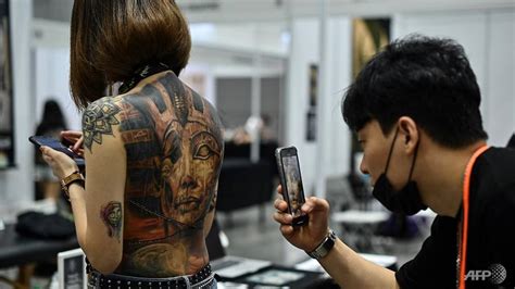 Malaysia Slams Tattoo Expo As Porn Over Half Naked Pics