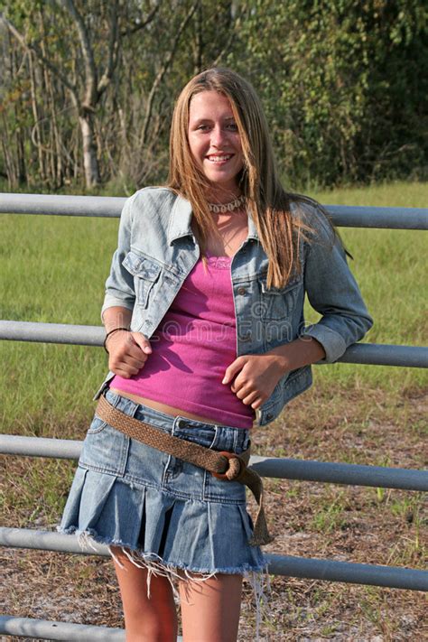 girl leaning on fence stock image image of girl ranch 241625