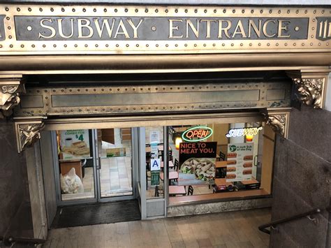 subway entrance   leads   subway restaurant