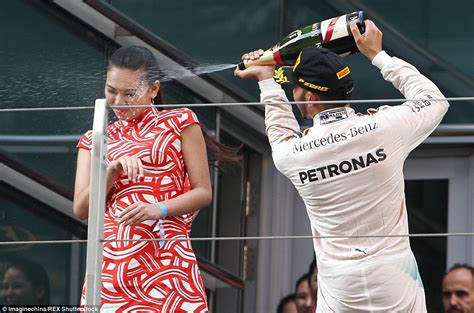 f1 s lewis hamilton under fire for spraying hostess at chinese grand